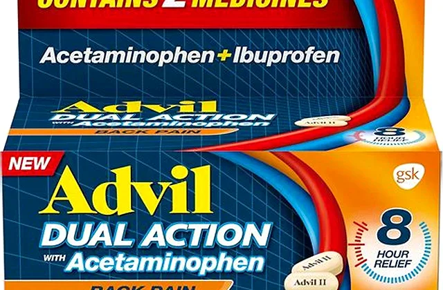 Tylenol acetaminophen next to ibuprofen and naproxen tablets for a pain reliever comparison